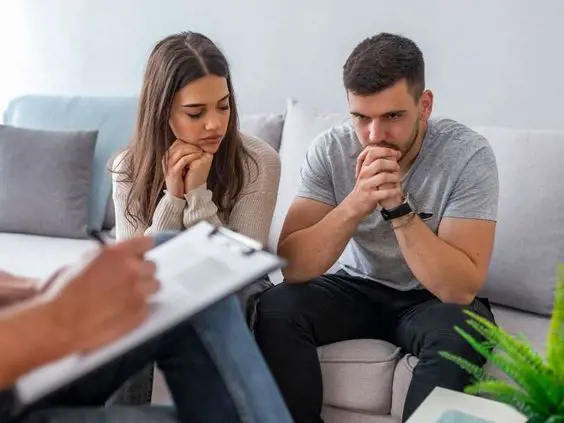 An unhappy couple during a couples counseling session