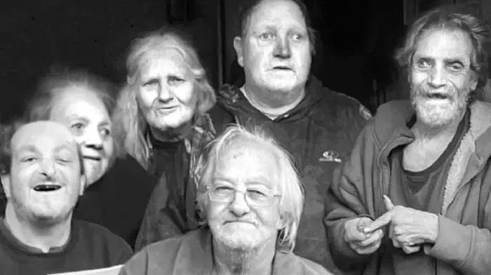 Whitaker Family (L-R) Timmy, Lorene, Betty, Kenneth, Ray, and Larry (front) at their home pose for a family picture. 