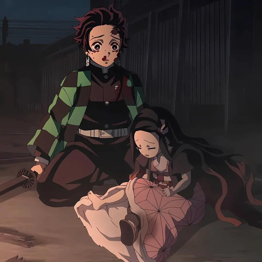 Tanjiro console a sad Nezuko as she lost her slipper